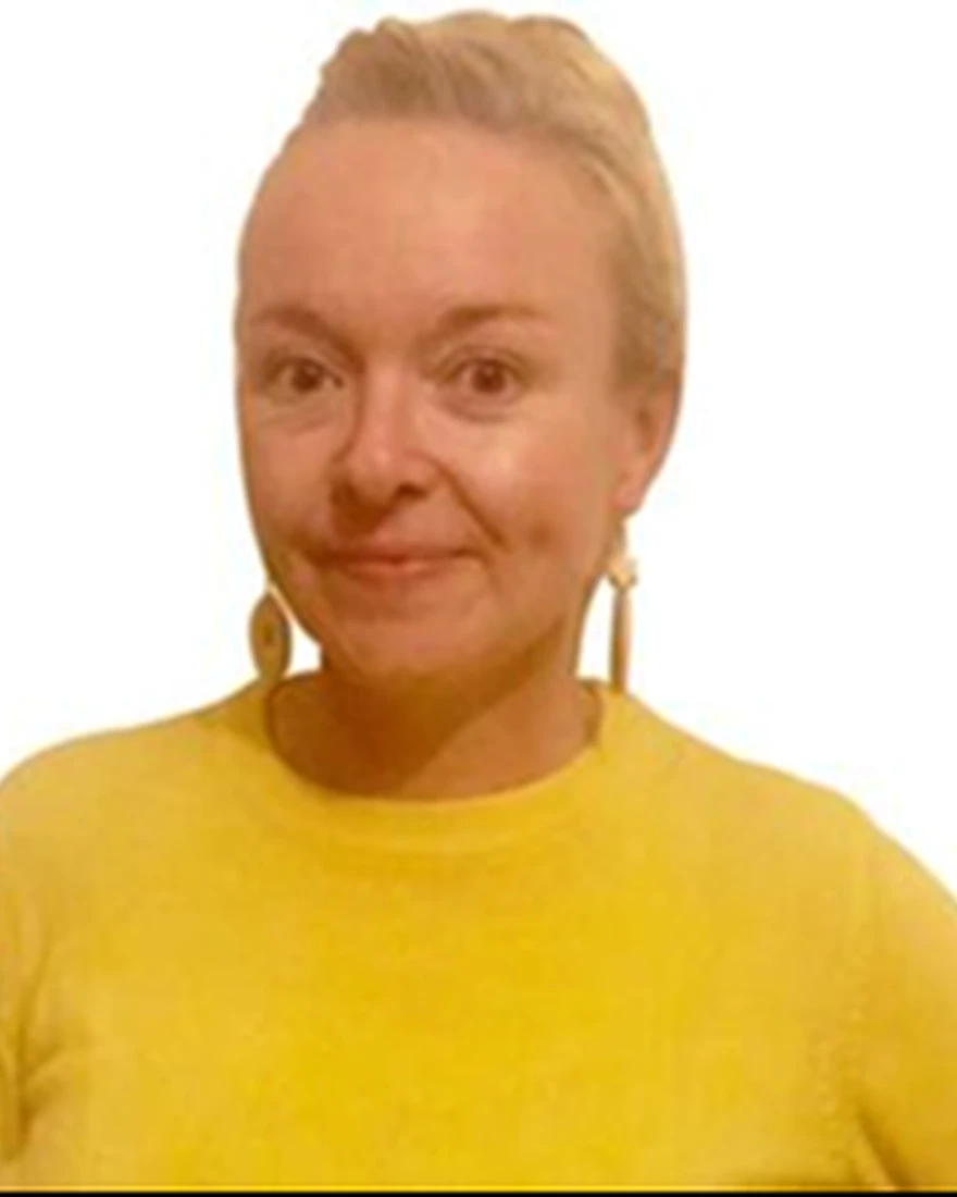 Caitlin O'Connel smiles in a headshot, showcasing expertise in early childhood education.